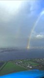 Vertical pilot airplane view of flying through double rainbow landing - Powered by Shutterstock - Get 15% off with code: PIKWIZARD15