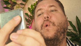 A man is talking on the phone. - Powered by Shutterstock - Get 15% off with code: PIKWIZARD15