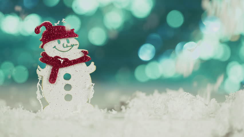 Christmas New Year Eve Concept Snowman and Bokeh Lights Behind