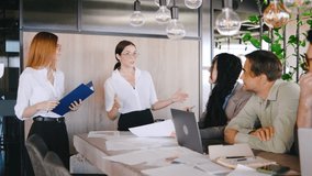 Successful Team Collaboration in a Modern Office Setting Featuring a Professional Presentation for Enhanced Creativity and Communication - Powered by Shutterstock - Get 15% off with code: PIKWIZARD15