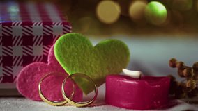 Love of Valentines Day Concept Hearts Wedding Rings and Red Candle Light - Powered by Shutterstock - Get 15% off with code: PIKWIZARD15