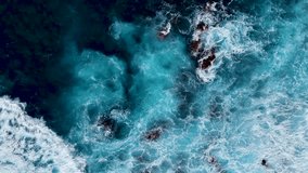 Atlantic ocean waves, rocks, cliffs, waves and turquoise water in Atlantic ocean, Mosteiros, Azores islands. Aerial 4K drone video footage of Acores archipelago - Powered by Shutterstock - Get 15% off with code: PIKWIZARD15
