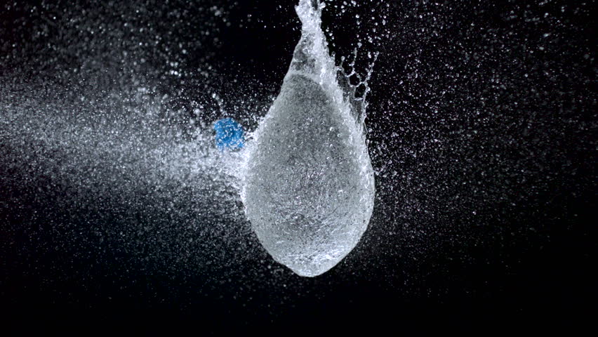 Popping water balloon on black background shooting with high speed camera, phantom flex. - Powered by Shutterstock - Get 15% off with code: PIKWIZARD15