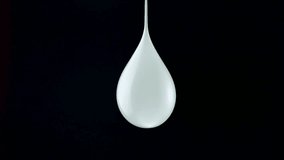 Popping water balloon on black background shooting with high speed camera, phantom flex.