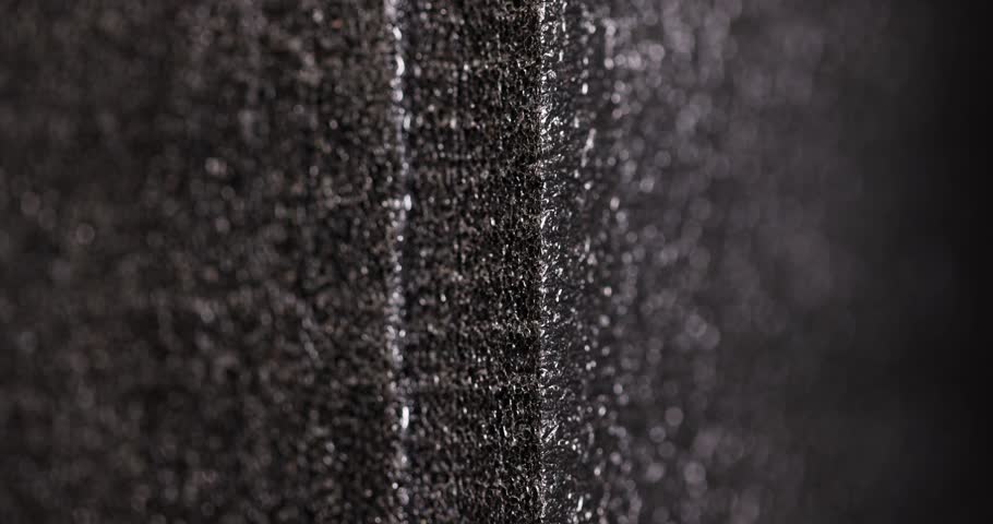 black foam material for insulation of buildings and packaging of goods, soft black foam material for construction and storage