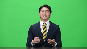 Male business person explaining something to the camera - Green screen footage for chromakey compositing - Powered by Shutterstock - Get 15% off with code: PIKWIZARD15