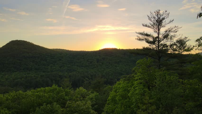 Aerial drone footage of the Adirondack Mountains and Lake George at sunset. Stunning landscapes, vibrant colors, and cinematic views perfect for travel, nature, and outdoor adventure projects 