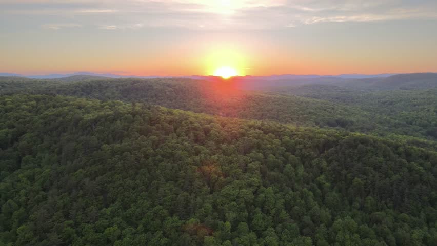 Aerial drone footage of the Adirondack Mountains and Lake George at sunset. Stunning landscapes, vibrant colors, and cinematic views perfect for travel, nature, and outdoor adventure projects 