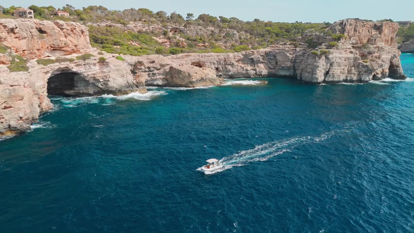 Aerial view of the Calo des Moro bay in Mallorca, Balearic Islands, Spain. Stunning Mediterranean Sea coast with turquoise water sea bay and white sand beach. Mallorca travel destinations