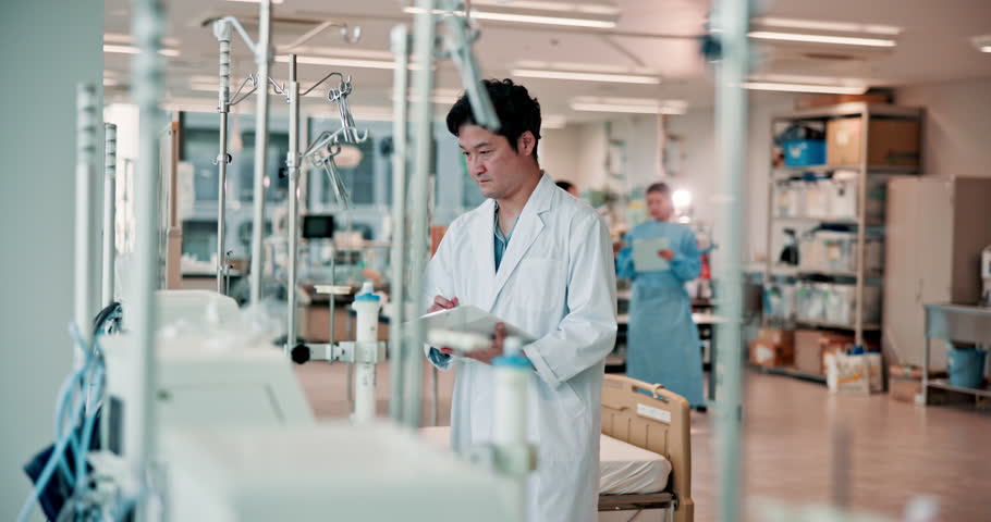 Science, equipment and tablet with Japanese man in laboratory for cancer research, inventory and healthcare. Medical study, dialysis machine and innovation with person in clinical for results