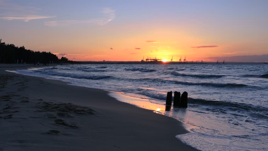 Sunset over the Baltic Sea beach in Gorki Zachodnie, Gdansk. Poland