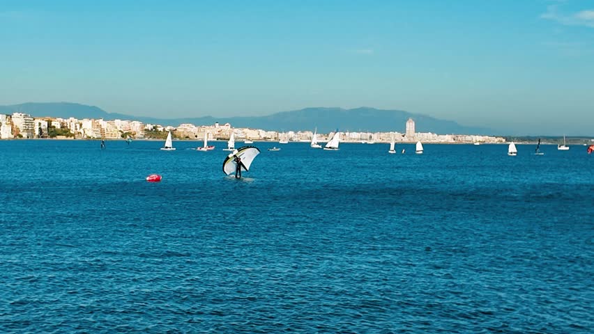 A serene view of a boat floating on calm waters in Anzio, Italy, captured in 4K resolution Perfect for travel, tourism, and maritime themes, showcasing tranquil seascapes a peaceful coastal enviroment