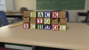 Letter Block Series-"Back To School" - Toy letter blocks tumble onto a school desk to form words,  then tumble out of frame - Powered by Shutterstock - Get 15% off with code: PIKWIZARD15