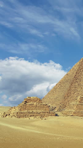 Timelapse with clouds over great pyramids at Giza Cairo in Egypt. Vertical video