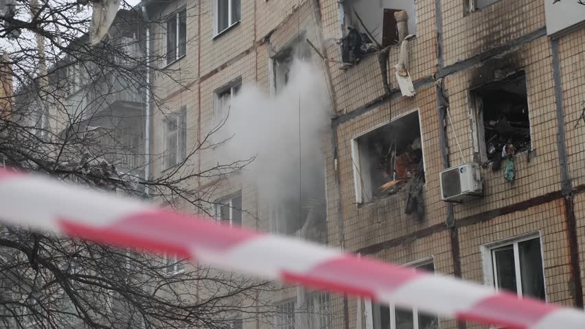Consequences of a house explosion
after a missile attack. Rocket attack. Burnt building, Rocket explosion, Building.
