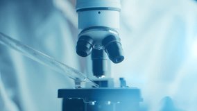 Virologist scientist using microscope in laboratory for biochemical research. Medical lab equipment, doctor researching vaccine development, studying disease to advance healthcare and treatments - Powered by Shutterstock - Get 15% off with code: PIKWIZARD15