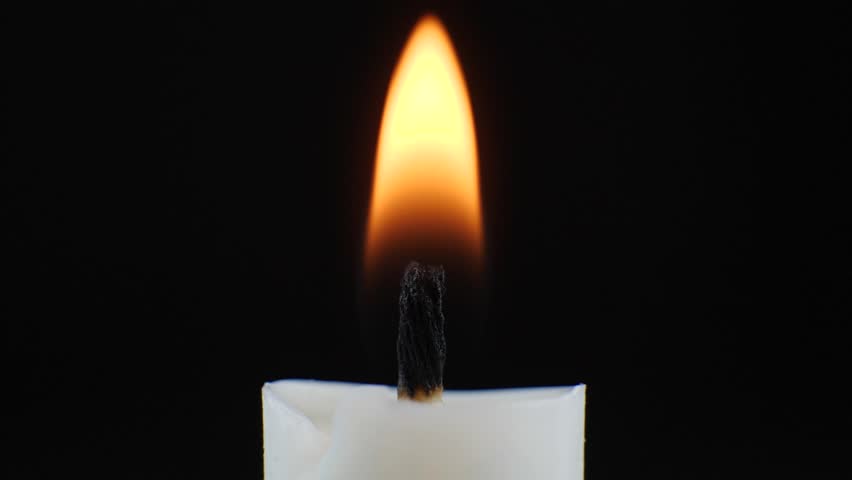 Extinguished Candle Flame Smoke on dark background