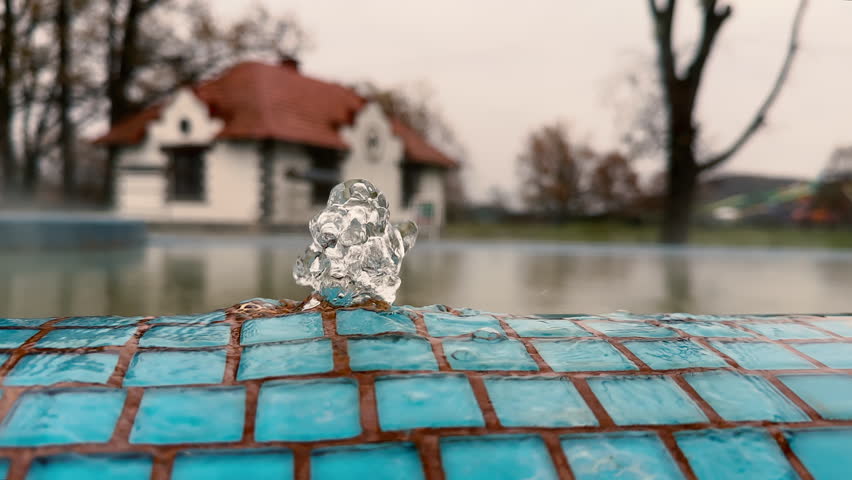 Hot thermal water gushes from the spring and flows down the pool creating a pleasant steam around the thermal resort. The concept of spa, wellness, relaxation