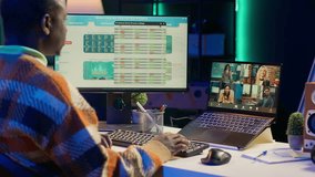 African American man having discussion during online meeting on laptop, talking about internet statistics or data. Freelancer use technology for virtual communication, working remotely. Camera A. - Powered by Shutterstock - Get 15% off with code: PIKWIZARD15