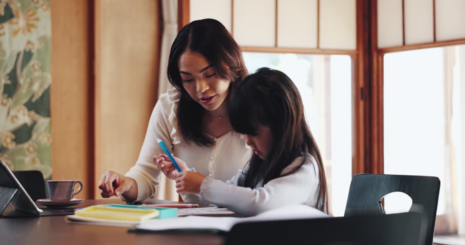 Writing, homework and Asian mom with child in home for learning, teaching and studying together. Family, education and Japanese mother help kid with books for school project, knowledge or development