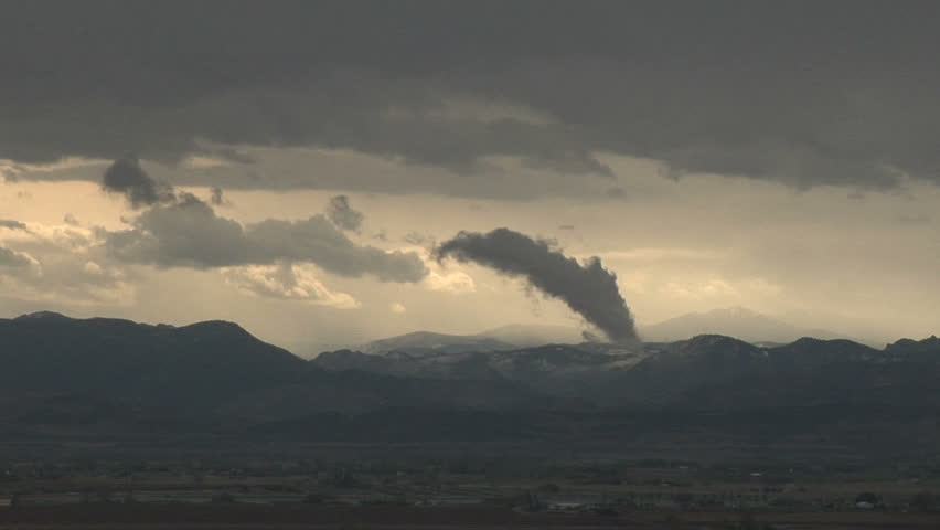 Jumping Clouds. Moist airflow running up a valley is being forced up and out of the end the V-shaped valley as puffs of scud and stratus cloud.