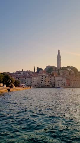 As the sun sets, the picturesque coastal town comes alive with vibrant colors. Rovinj Croatia Adriatic sea