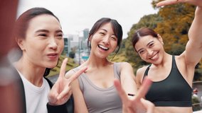 Happy, asian women or selfie with peace sign for photography, picture or memory together in fitness or city. Portrait, japanese or female people with smile, emoji or POV for capture on bridge in town - Powered by Shutterstock - Get 15% off with code: PIKWIZARD15