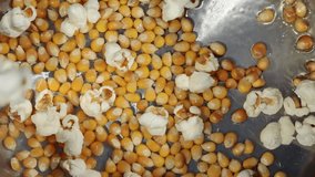 The Popcorn popping cooking.The most beautiful isolated background. - Powered by Shutterstock - Get 15% off with code: PIKWIZARD15