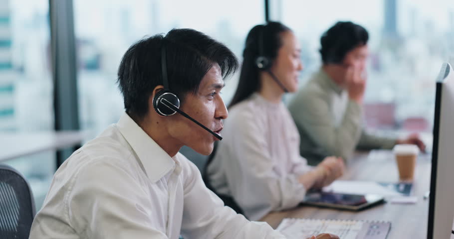 Virtual assistant, staff or Asian man on computer in call center for consulting, online help or advice. Coworking, consultant or Japanese agent with support for telemarketing or sales communication