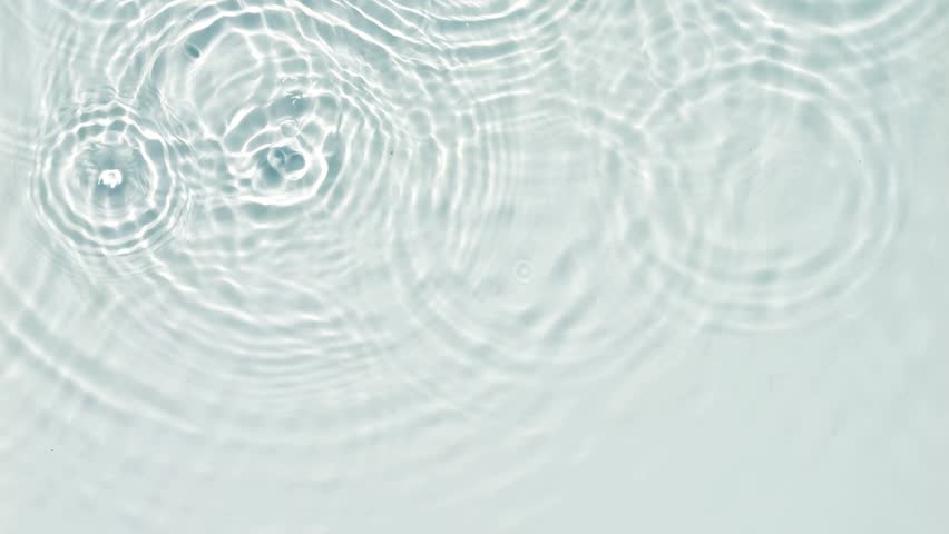 closeup of falling water drops on transparent white water surface with sunlight reflection, abstract purity in nature concept background for beauty spa, pharmacy and cosmetics, top view - Powered by Shutterstock - Get 15% off with code: PIKWIZARD15
