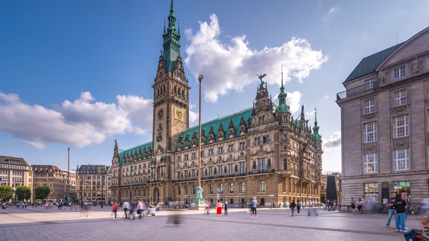 Hamburg main square Rathausmarkt. Rathausmarkt (lit. City Hall Marketplace) time lapse in front of town hall cathedral hamburg germany.