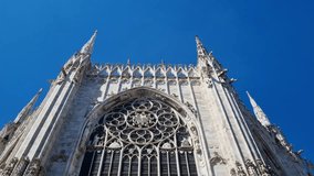 Italy, Milan, Milan Cathedral, Rose Window. Three stained glass windows with intricate tracery, designed by Nicolo di Bonaventura and Filippino degli Organi da Modena (1390–1402). - Powered by Shutterstock - Get 15% off with code: PIKWIZARD15