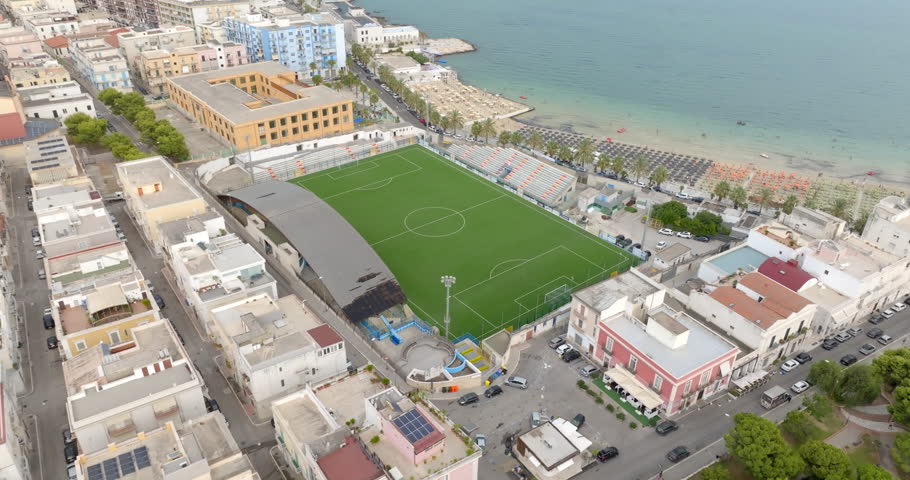 Aerial view of the Miramare stadium in Manfredonia, in the province of Foggia, Puglia, Italy. It is the stadium of the city team and is located near the sea and the beaches.