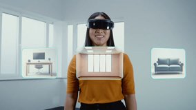 Creative Asian female designer wearing VR headset uses online design software to create interior in office room or apartment in 3D virtual space. Augmented reality technology. Futuristic VFX animation - Powered by Shutterstock - Get 15% off with code: PIKWIZARD15