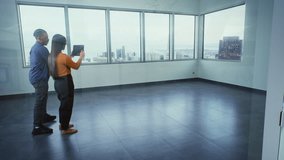 Diverse team of creative designers uses digital tablet computer and augmented reality AI interior design software to build office room. 3D graphics of furniture and digital equipment. VFX animation. - Powered by Shutterstock - Get 15% off with code: PIKWIZARD15