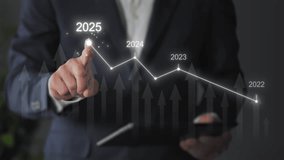 businessman hand drawing graphic chart of business growing over years,successful 2025 achieving target,profit growth - Powered by Shutterstock - Get 15% off with code: PIKWIZARD15