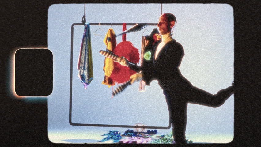 A dynamic juggling act featuring a performer in a striking monochrome outfit, skillfully tossing and catching vibrant striped props