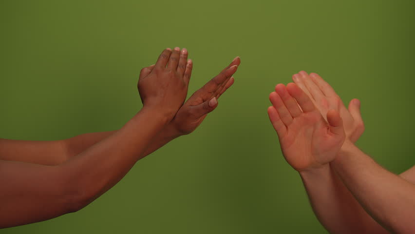 A Man and A Woman Saying no with hand gesture - Stop Hands Sign Simbol isolated on green screen background