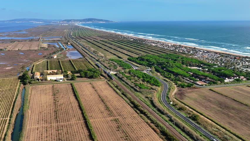 Scenic Étang de Thau featuring expansive lagoons, lush greenery, and a vibrant shoreline