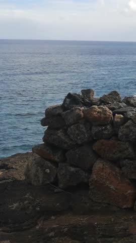 Ocean Waves Meeting the Rugged Shores of Easter Island, Chile - Vertical Video