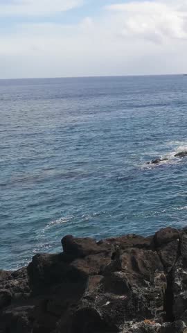 Rocky Coastline With Waves Crashing on Easter Island, Chile - Vertical Video