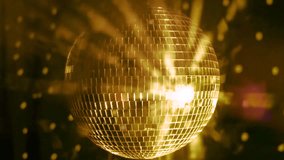 Shimmering disco ball reflects vibrant lights in an energetic dance setting at a lively party night - Powered by Shutterstock - Get 15% off with code: PIKWIZARD15