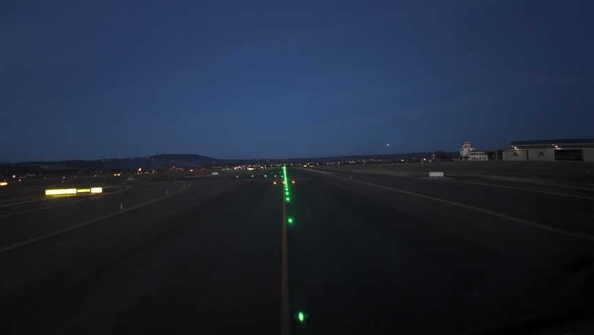 Pilot’s FPV in a take-off from Palma de Mallorca airport, Balearic Islands, Spain. Hyperlapse recorded from a jet cockpit at dusk. Immersive pilot’s view. 4K