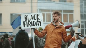 Funny man hold black Friday flash sale banner city street. Crazy male person wave big special offer promo placard. Promotion poster mock up. Joy fun guy show seasonal ad. Hot price off day. Red advert - Powered by Shutterstock - Get 15% off with code: PIKWIZARD15