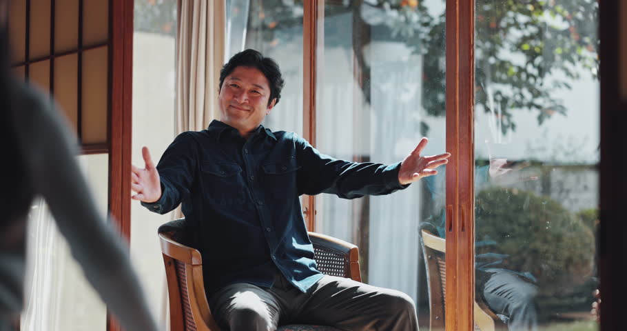 Father, girl and hug of Japanese family in home with love, care and support together with smile. Happy, cute and youth development by living room window on weekend with fun and joy from embrace