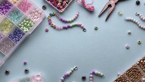 Crafting friendship bracelets with colorful beads - Powered by Shutterstock - Get 15% off with code: PIKWIZARD15