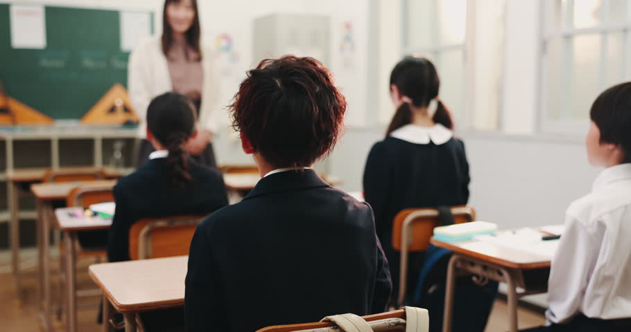 Question, hands up and Asian students in classroom with answer, feedback and knowledge for quiz in lesson. School, asking and Japanese teacher with children for education, learning and studying