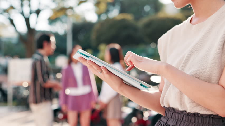 Tablet, outdoor hands of woman in town for research, travel or real estate agent reading news. Technology, businesswoman or realtor in city for online listing, ideas or urban development in Japan