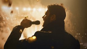 Silhouetted Singer Performing On Stage With Dramatic Pyrotechnic Light Show Performance Entertainment Concert - Powered by Shutterstock - Get 15% off with code: PIKWIZARD15