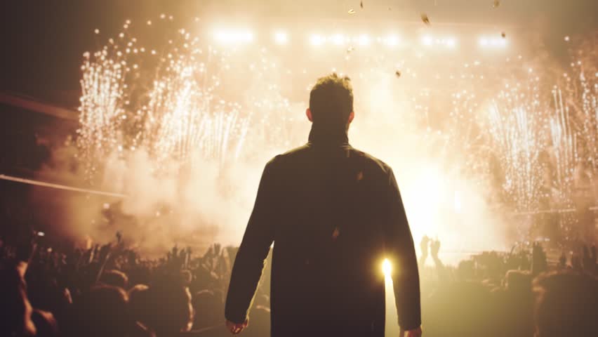 Victorious Silhouette Raises Arms In Golden Confetti Celebration Success Achievement Victory Energy